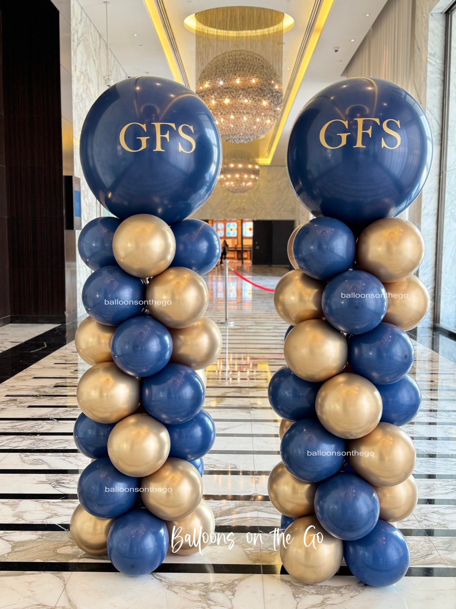 Navy Blue and Gold balloon Towers