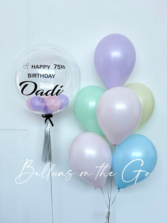 Customized bubble balloon with pastel bouquet