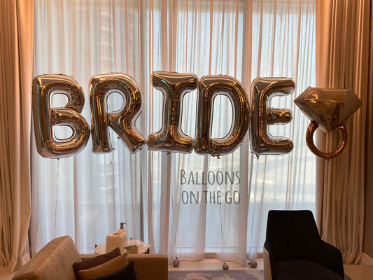 Letters BRIDE with a diamond Ring for a Bride to be